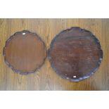 Two 19th century mahogany scalloped circular trays