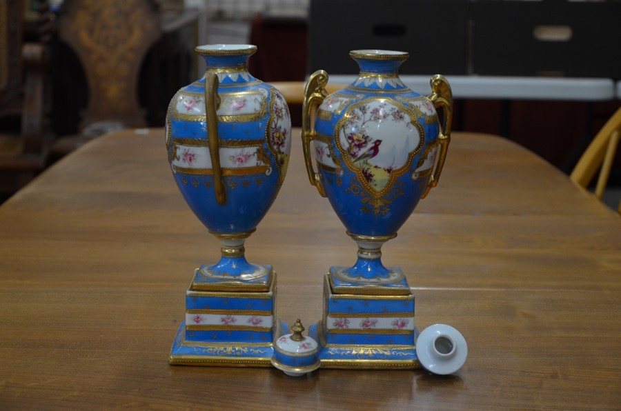A pair of Continental blue-ground urn vases and covers in the Sevres manner, with floral-painted and - Image 3 of 4