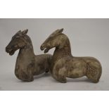 A pair of faux marble composite horse torso figures, in the Roman manner, 35.5 cm high