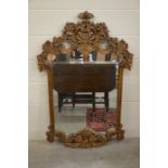 A large wall mirror in decorative carved dark oak frame, 135 cm high x 86 cm wide, 2nd half 20th