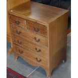 A small Georgian style bachelor's chest with slide over two short and three long drawers, 74 cm high