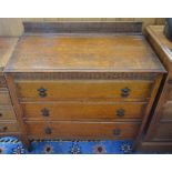 A carved oak chest of three long drawers with gallery, 86 cm wide x 77 cm high x 45 cm deep