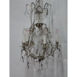 A good quality crystal glass drop five lamp chandelier