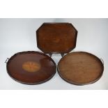 A trio of antique mahogany serving trays (3)