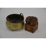 A Chinese soapstone Qilin seal to/w a miniature brass tripod censer with Xuande mark (2)