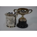A Victorian Christening mug and a later trophy cup