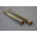 Two mother-of-pearl and 9ct rose gold cheroot holders