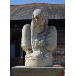 Richard Hayward, a carved stone statue on an associated stone plinth, 130 cm high overall