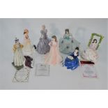 Four Royal Doulton figures and three Coalport figures