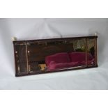 A 19th century mahogany framed landscape mirror, 127 cm w x 49 cm h