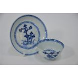 A Chinese export blue and white Nanking Cargo cup and saucer