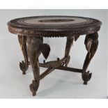 A 20th century Indian carved hardwood Elephant table