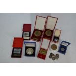 An unusual selection of Post War Soviet Sports medallions etc
