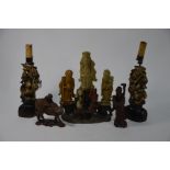 A group of Chinese soapstone and hardwood carvings