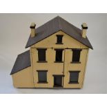 An antique painted pine doll's house