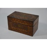 A 19th century parquetry tea caddy