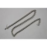 An Italian white metal bead chain necklace
