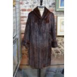 A dark brown shadowed mink fur coat
