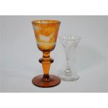 A 19th century German amber flash goblet and trumpet-shaped flute-glass
