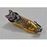 A gold and diamond set antique brooch in the form of a cat and boot