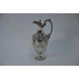 A late Victorian silver urn-shaped ewer