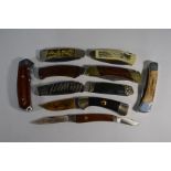 Five Franklin Mint folding pocket knives, three Buck knives and two others