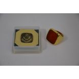 A large 18ct yellow gold signet ring with cornelian intaglio