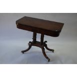 A Regency mahogany and rosewood cross-banded D-end folding card table