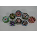 Eight various millefiori cane paperweights