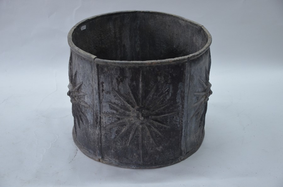 An antique lead circular planter