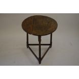 An 18th century oak cricket table