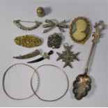 A collection of silver and white metal jewellery