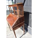 An Edwardian walnut part-glazed ladies writing desk