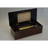 A late 19th century rose and ebonised cased cylinder music box