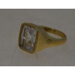 An 18ct yellow gold signet ring with rectangular rock crystal intaglio