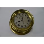 H Hughes & Son Ltd, London, a brass cased single fusee bulkhead clock