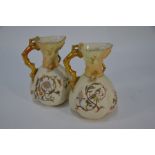 A pair of Victorian Royal Worcester jugs