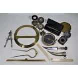 A Surveyor's compass and other instruments