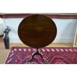 A George III mahogany tilt-top tripod table