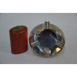 A red-lacquered silver oval pot and cover and a Siamese ashtray