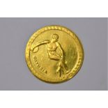 A 1972 Munich Olympic gold token