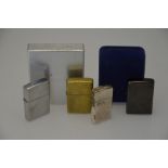 Four various Zippo cigarette lighters