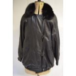 A black crocodile effect soft leather lady's jacket and black leather jacket