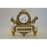 A 19th century Empire style gilt-metal and white marble mantel clock