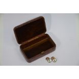 A pair of Edwardian 9ct button cufflinks