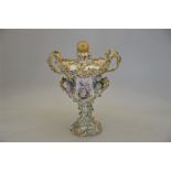 A large Victorian floral-encrusted china pot pourri vase and cover