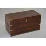 A Victorian style brass bound hardwood trunk