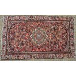 An old Persian Hamadan rug, 252 cm x 155 cm