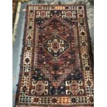 An old Persian Shiraz rug 214 cm x 142 cm