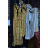 Two pairs of thermal lined curtains in yellow and orange floral design